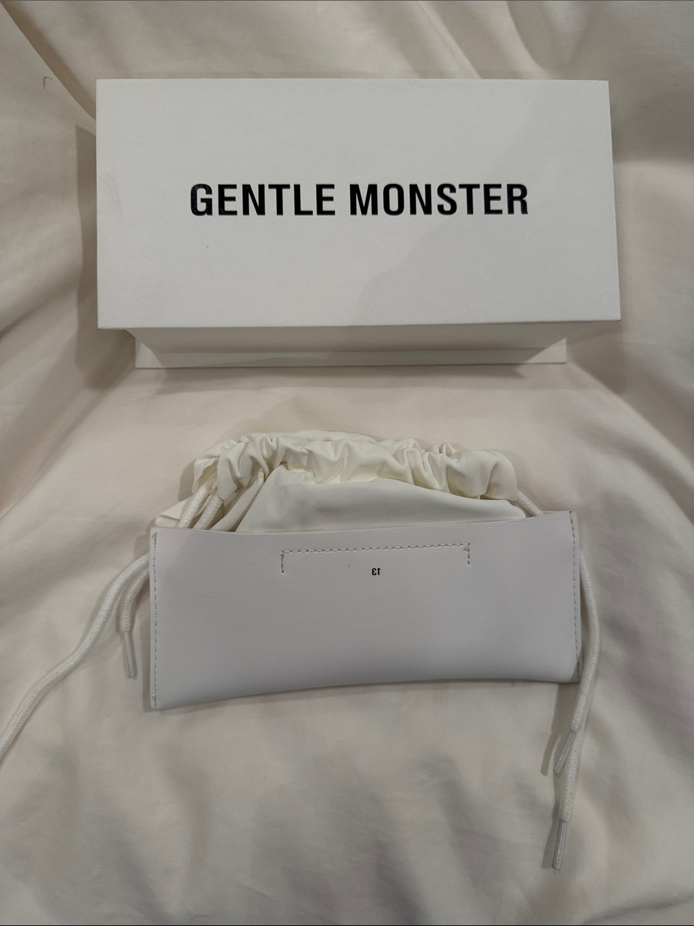 GENTLE MONSTER White Drawstring Sunglass Pouch